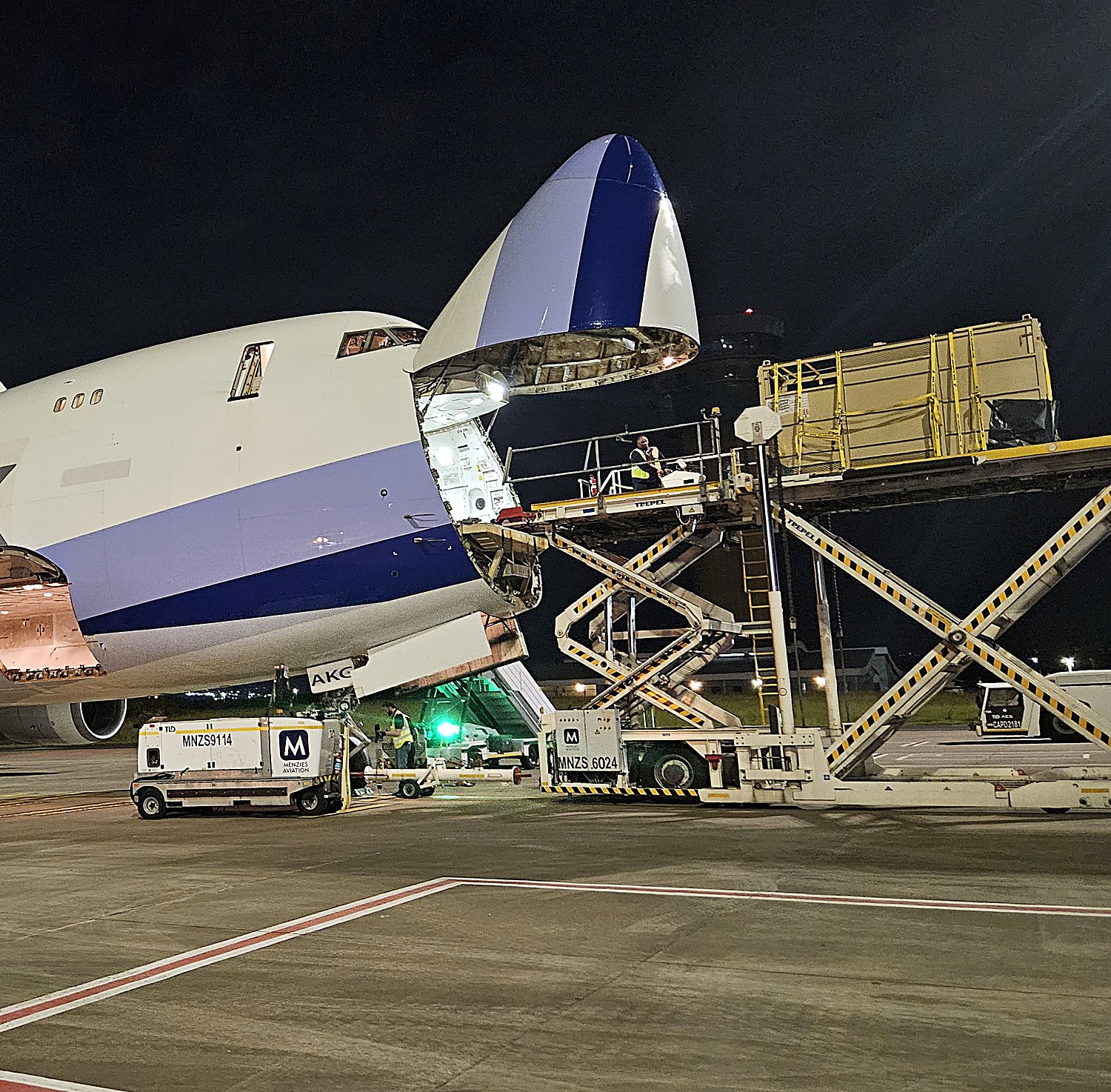 Night ramp operations, aircraft being worked before departure